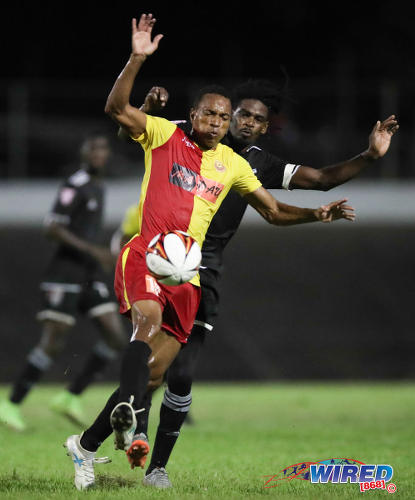 Photo: North East Stars midfielder Densill Theobald (left) holds off Central FC attacker Jason Marcano during Pro League action at the Arima Velodrome on Friday 8 September, 2017. (Courtesy Allan V Crane/CA-Images/Wired868)