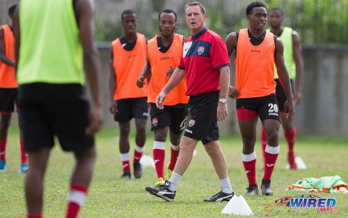 Photo: Trinidad and Tobago National Senior Team head coach Terry Fenwick (centre) guides his team during practice at the Police Barracks in St James on 3 July 2020. (Copyright Allan V Crane/CA-Images/Wired868)