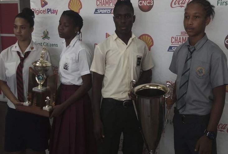 CAPTAINS ON SHOW: From left to right, Ria Dos Santos (Bishop’s Anstey), Latiffa Pascall (Pleasantville), Renaldo Boyce (San Juan North) and Juda Garcia (Shiva Boys) occupy centre stage at the InterCol Finals launch yesterday at Hasely Crawford Stadium.
