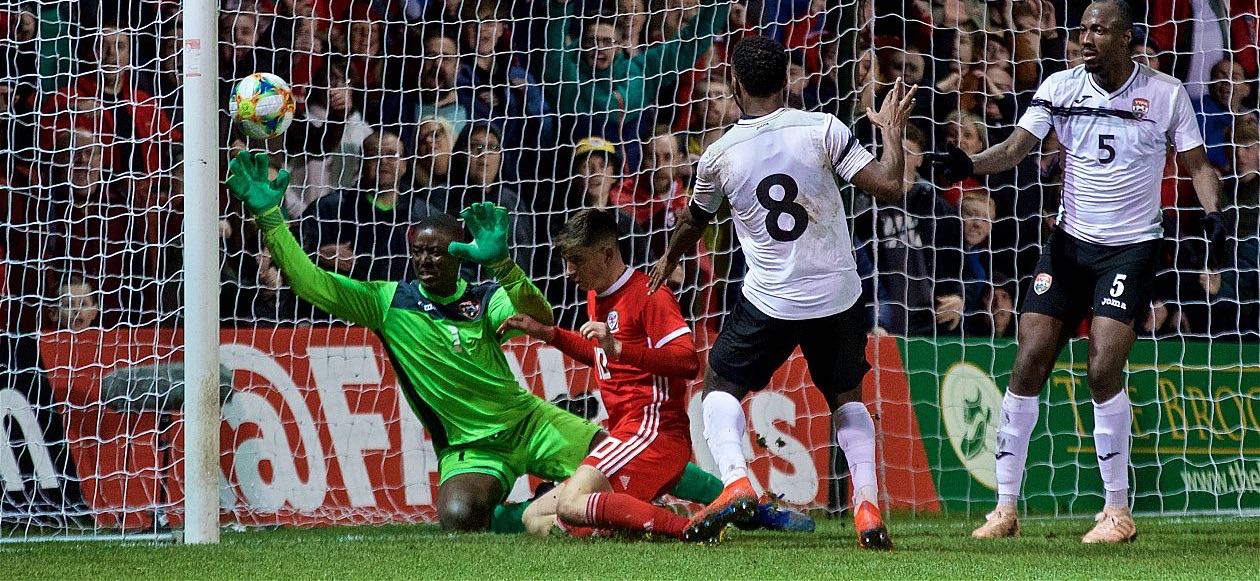 Ben Woodburn strike seals it late for Wales in 1-0 victory over T&T.