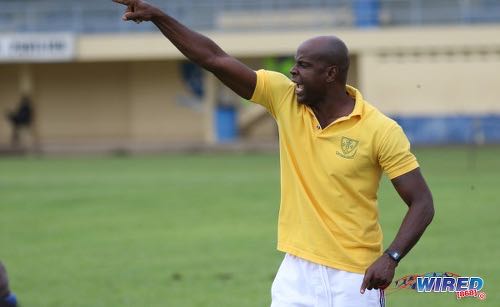 Photo: St Benedict’s College coach Leonson Lewis points the way forward for his team during SSFL Premier Division action against East Mucurapo at Mucurapo Road on 6 October 2016. ...Lewis is also a Trinidad and Tobago National Under-13 Team assistant coach and W Connection youth coach. ...(Courtesy Sean Morrison/Wired868)