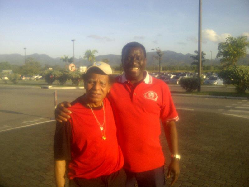 Mr. Selby Browne, Vice President, of the Veteran Footballers Foundation of Trinidad and Tobago (VFFOTT) greeting Mr. Auguste Â“Cha ChaÂ” Wooter, at Piarco International Airport, Trinidad and Tobago in January 2013.
