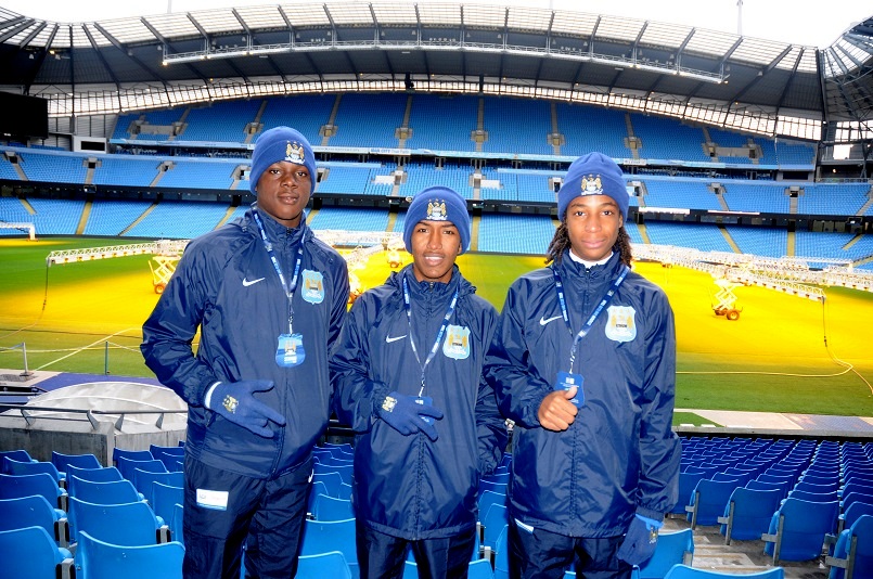 Elijah Shade, John-Paul Rochford (centre), and Tyrell Emmanuel at Manchester City’s Etihad Stadium.