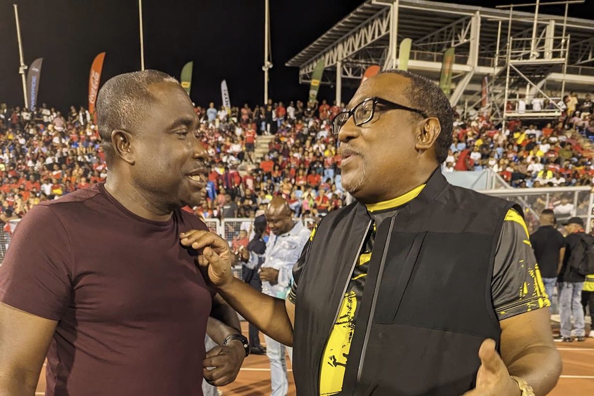 Trinidad and Tobago Head Coach Angus Eve (left) and Guyana Head Coach Jamaal Shabazz (right) sharing a moment at the Legends vs T&T All Stars game at the Hasely Crawford Stadium, Mucurapo on Friday, May 10th 2024.