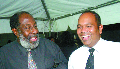 Richard Groden, left, pictured with Om Lalla in an undated photo. (T&T Newsday)