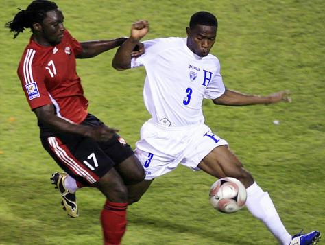 Kenwyne Jones battles on with Honduras defender Figueroa