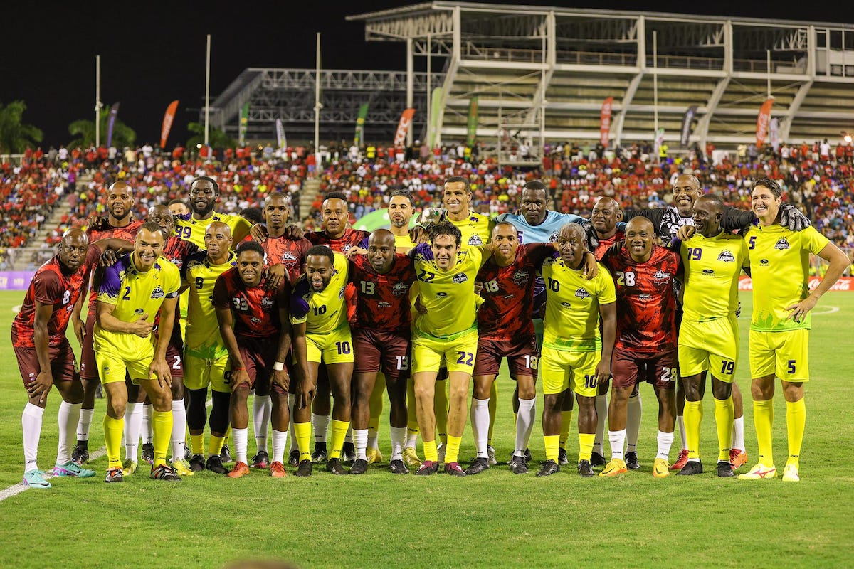 The starting elevens for the Legends and T&T All-Stars teams, pose for a group photo at the Hasely Crawford Stadium, Mucurapo on Friday, May 10th 2024.