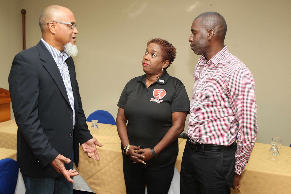 Keith Look Loy, left, president of the T&T Super League addresses the media while flanked by Northern Football Association general secretary, former national youth goalkeeper Rayshawn Mars, right, and then Women’s League of Football (WoLF) president Susan Joseph-Warrick at Normandie Hotel, St Ann's, in June 2019. Jospeh-Warrick resigned as WoLF president and as TTFA second vice president in November 2019.  Photo: ANTHONY HARRIS