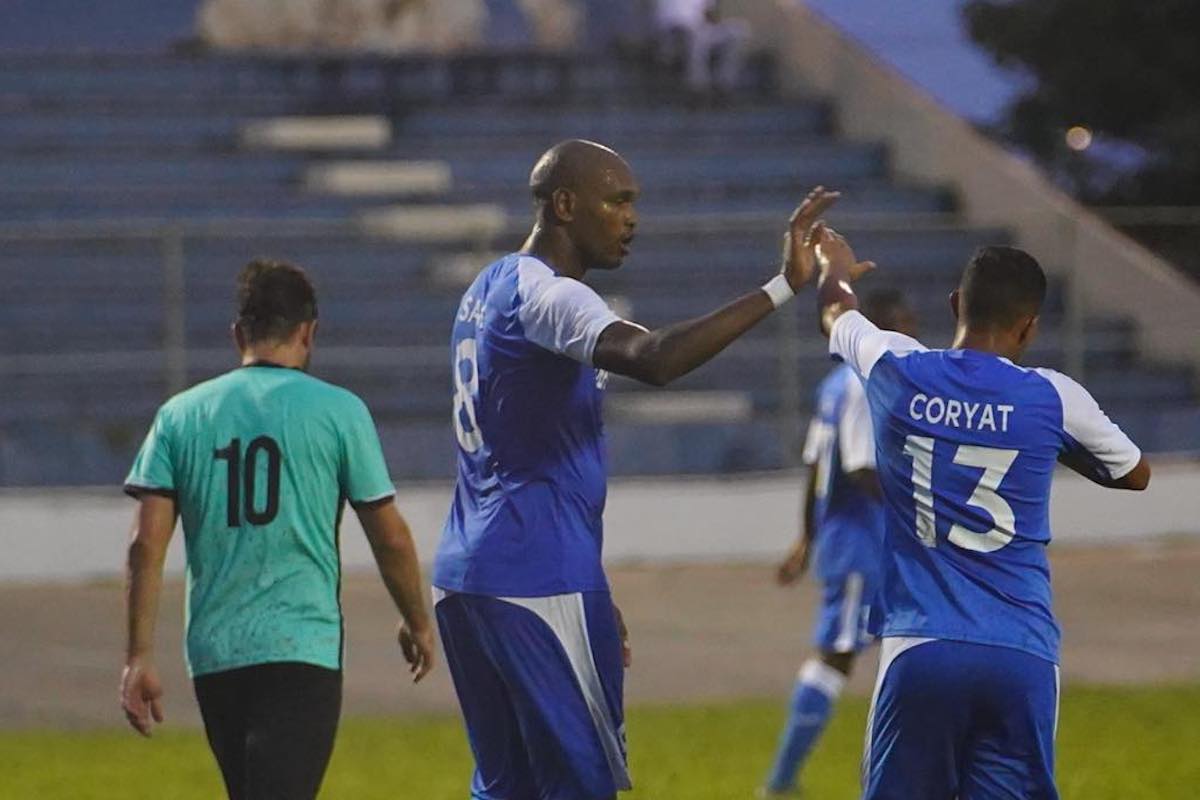 Defence Force's Brent Sam (#8) and Rivaldo Coryat (#13) celebrate after scoring a goal during a 6-1 win over Queen's Park at the Arima Velodrome on Tuesday, July 4th 2023