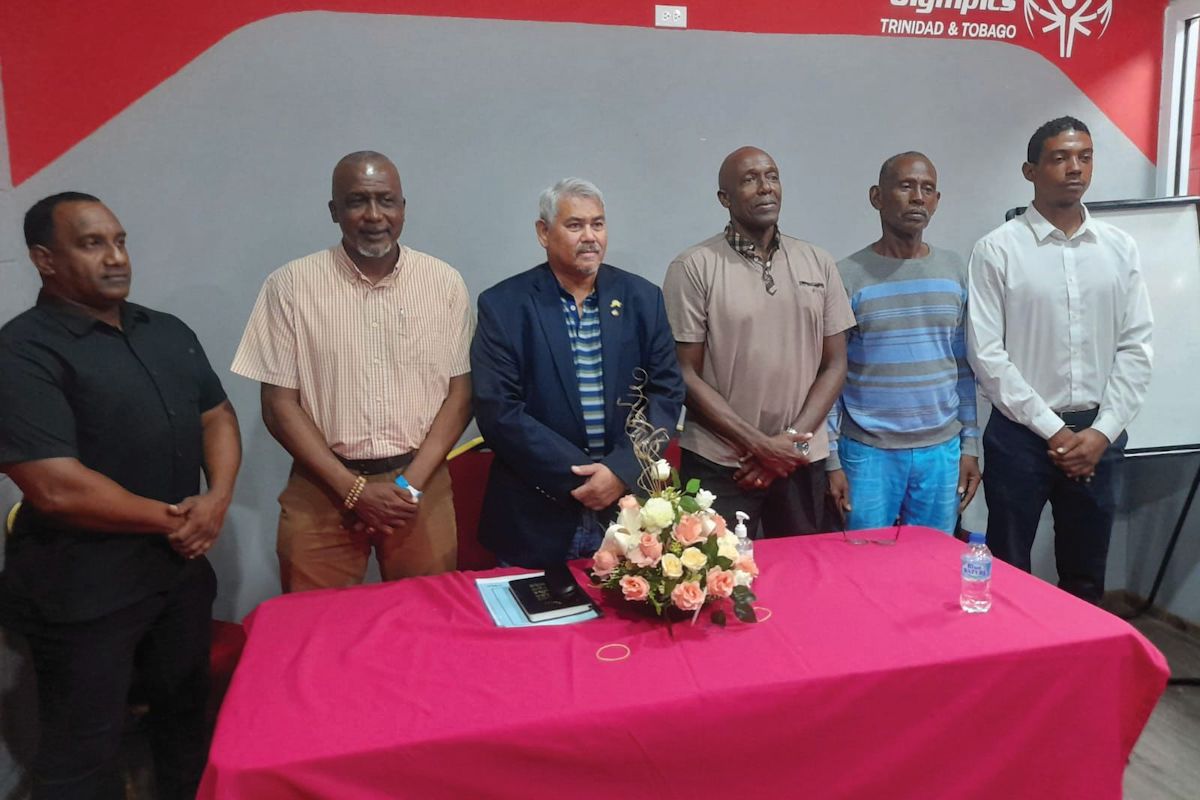 New SFA president Denis Latiff, third from left, is flanked by members of his executive—Joseph Rooplal, left, public relations officer, Aldwyn Ferguson Jr, second from left, 1st VP, Michael Maurice, third from right, the general secretary—administration, Clayton Williams, second from right, the secretary – operations) and Dwight De Leon, right, who was newly-appointed general secretary.