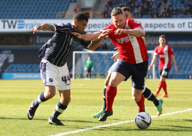 Millwall's Carlos Edwards, (left) battles for possession of the ball with Blackburn Rovers' David Dunn, (right).