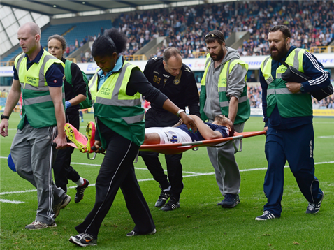 Carlos Edwards is stretchered off against Nottingham Forest