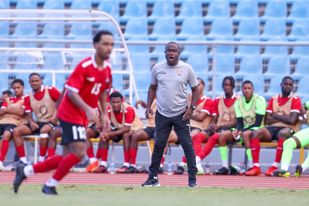 Trinidad and Tobago Head Coach Angus Eve shouts instructions from the sidelines during an International Friendly against Jamaica at Hasely Crawford Stadium, Port of Spain on March 1st 2024.