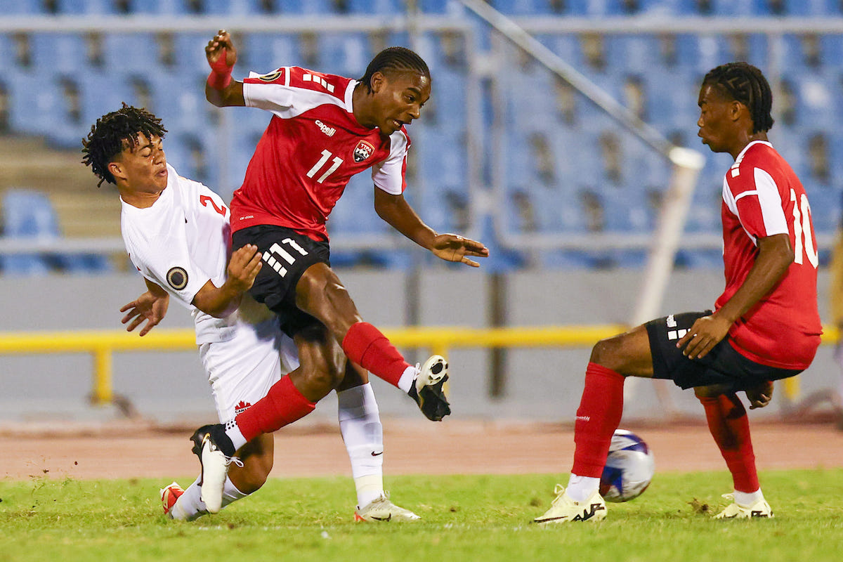 Trinidad and Tobago U-20's Derrel Garcia (#11) and Lindell Sween (#10) in action during a Concacaf U-20 Qualifier match against Canada at the Hasely Crawford Stadium, Port of Spain on February 27th 2024.