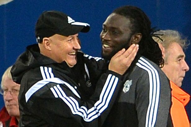 Kenwyne Jones and Cardiff City manager Russell Slade