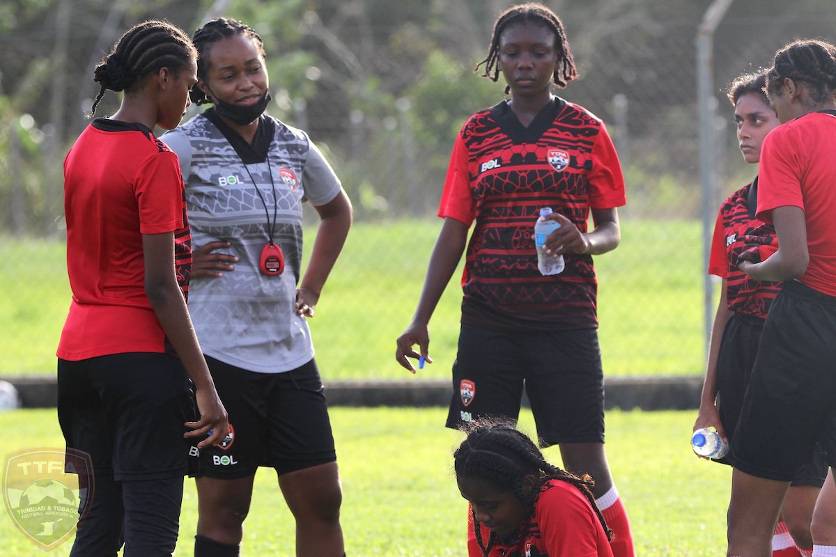 Trinidad and Tobago Women's U-17 Assistant Coach Dernelle Mascall with players during a training session on March 10th 2022 at the Auto Boldon Stadium, Couva.