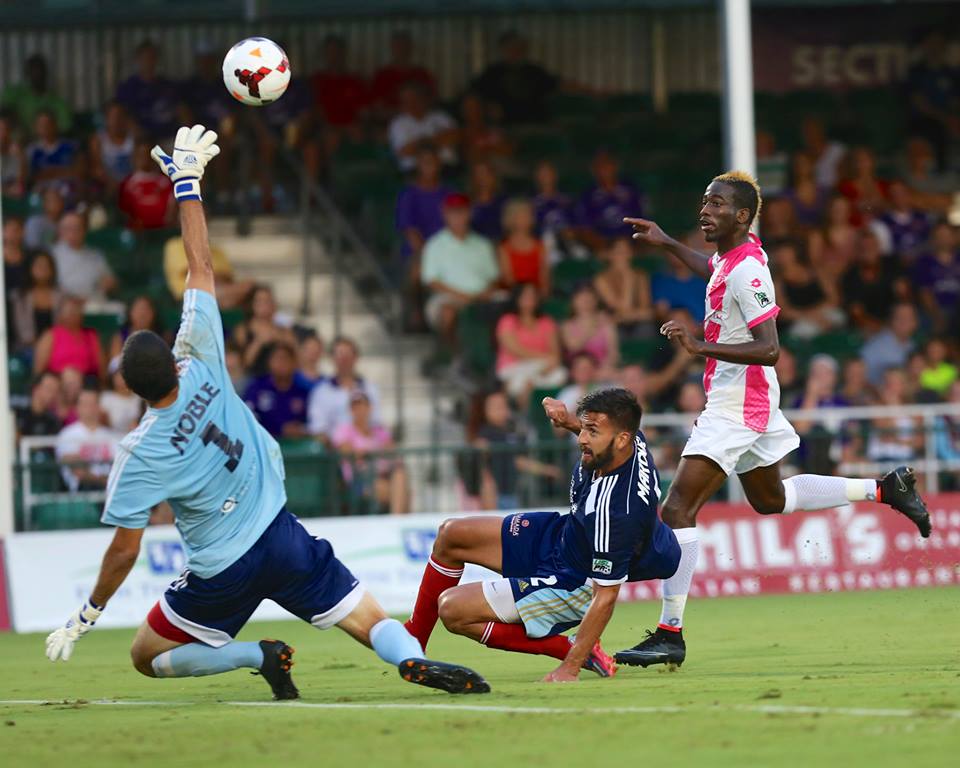 Kevin Molino scores with a cheeky chip against Harrisburg City Islanders on August 16th 2014.