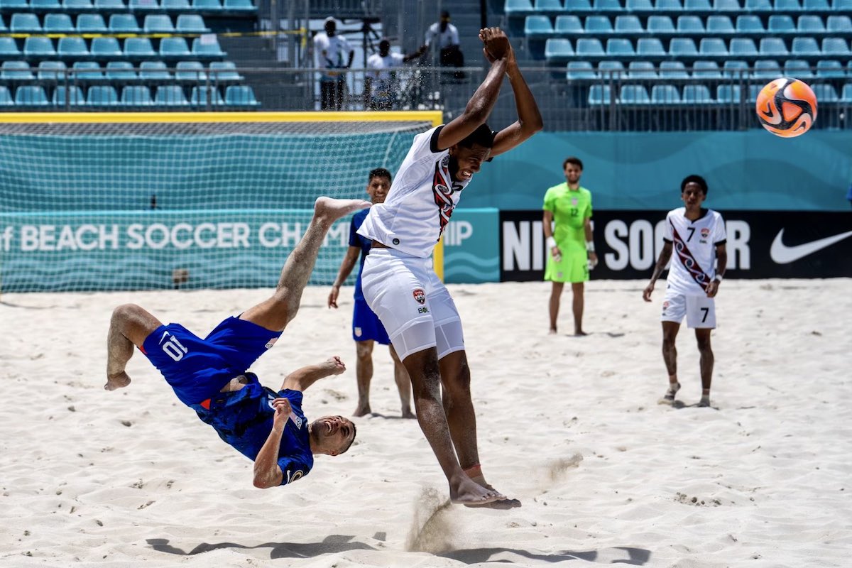 USA's Gabriel Silveira (#10) attempts a bicycle kick during a 6-2 win over Trinidad and Tobago at the 2023 Concacaf Beach Soccer Championship.
