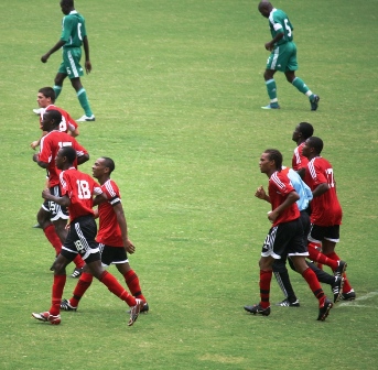 T&T Under 17 celebrates after scoring on Nigeria (Photo: Shaun Fuentes)..