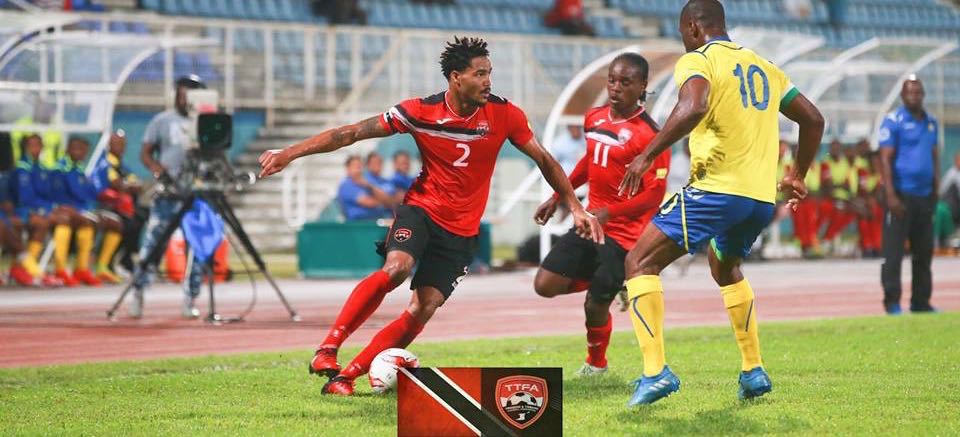 T&T's Alvin Jones, team mate Darren Mitchell and Barbados' Arantees Lawrence, during the international Friendly between Trinidad & Tobago and Barbados at the Ato Boldon Stadium, Couva. Photo: Matthew Lee Kong/CA-images