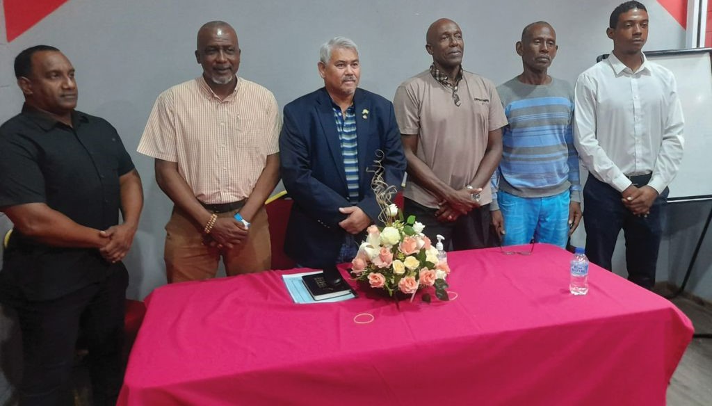New SFA president Dennis Latiff, third from left, is flanked by members of his executive Joseph Rooplal, from left, Public Relations Officer, Aldwyn Ferguson Jr, VP, Michael Maurice, General Secretary - Administration, Clayton Williams, Secretary - Operations and Dwight De Leon, newly appointed general secretary. ...Keith Clement
