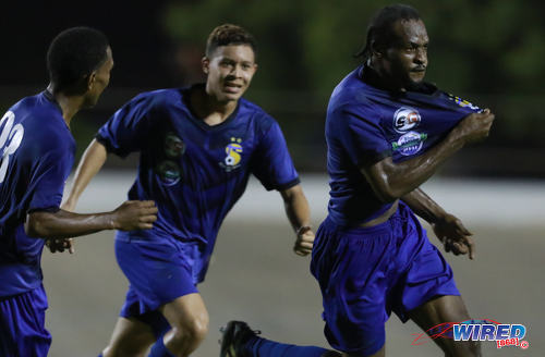 Photo: FC Santa Rosa left back Osei Sandy (right) celebrates the opening goal against Guaya Utd while teammate Rivaldo Coryat (centre) tries to catch up during Ascension Invitational action at the Arima Velodrome on 23 August 2019. (Copyright Nicholas Bhajan/CA-Images/Wired868)