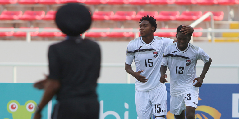 Trinidad & Tobago's Kathon St. Hilaire (#15) celebrates with teammate Micah Lansiquot after scoring against El Salvador in the CONCACAF Under-20 Championship on February 25, 2017, in Tibas, San Jose, Costa Rica. (Photo: Straffon Images)