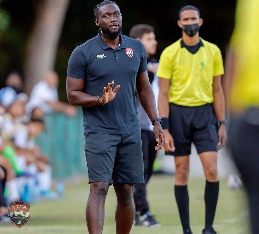 National senior women’s football head coach Kenwyne Jones gives instructions during an international friendly match between T&T and the Dominican Republic at the San Cristobal Panamerican Satdium in Dominican Republic on Friday. T&T suffered a 2-1 loss. The teams will meet again on Tuesday in a second internaional friendly ahead of next year's 2022 CONCACAF W Qualifiers.  Courtesy TTFA Media