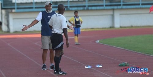 Photo: FC Santa Rosa head coach and TTSL president Keith Look Loy talks to fourth official Gordon Maloney during TTSL action against UTT at the Larry Gomes Stadium on 10 December 2017. (Courtesy Sean Morrison/Wired868)