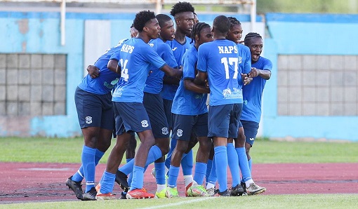 Players of Naparima College celebrate with midfielder Kanye Francis (C) after he scored their first goal during the SSFL Tiger Tanks Super Cup match between Naparima College and Presentation College San Fernando at the Ato Boldon Stadium in Balmain, Couva on Friday....Daniel Prentice