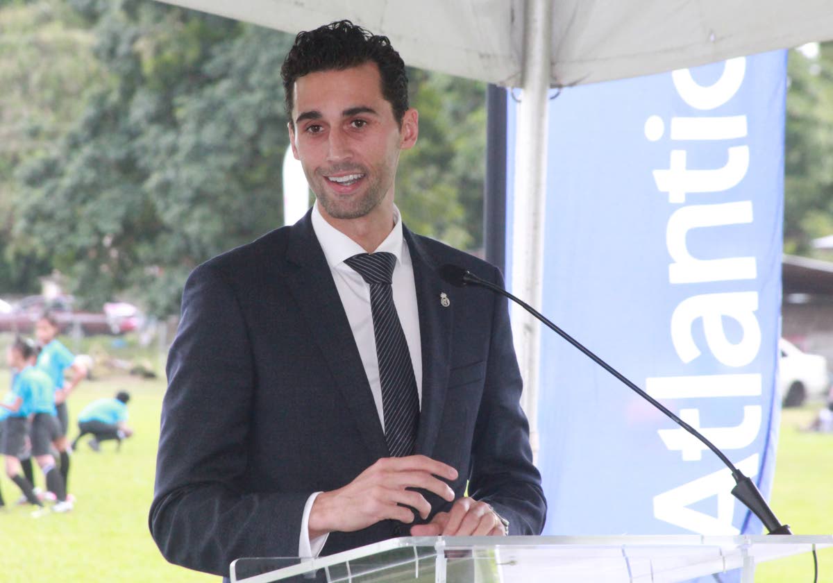 Former Span and Real Madrid footballer Alvaro Arbeloa, now a Real Madrid Foundation Ambassador speaks to young football fans at the St Mary’s College Grounds, Port of Spain, yesterday.