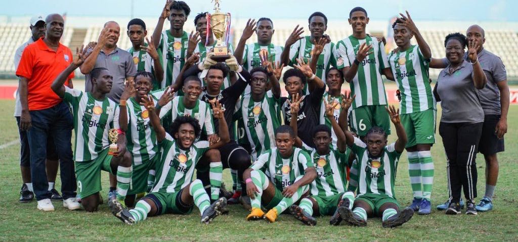 East Zone Intercol Champions San Juan North players and staff dsiplay the winners trophy after beating St Augustine 3-1 in the Coca Cola Intercol East Zone final, on Nov 21, at Larry Gomes Stadium, Malabar. - Daniel Prentice/CA-images