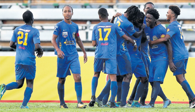Shiva Boys players celebrate a goal during their opening fixture in the 2017 SSFL against Naparima College at the Ato Boldon Stadium, Couva on September 8. Shiva boys won the match 2-1.
