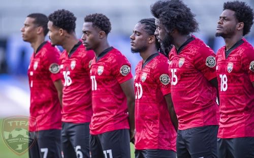 Photo: Trinidad and Tobago Men’s National Senior Team players (from left) Ryan Telfer, Alvin Jones, Noah Powder, Duane Muckette, Neveal Hackshaw and Triston Hodge line up before kick-off against El Salvador at the 2021 Concacaf Gold Cup in the Toyota Stadium, Frisco. (via TTFA Media)