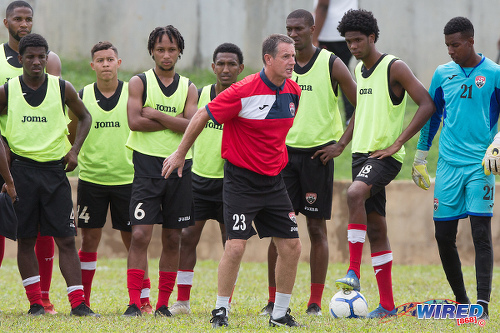 Photo: Soca Warriors coach Terry Fenwick (centre) demonstrates to his players during training at the Police Barracks, St James on 3 July 2020. (Copyright Allan V Crane/CA-Images/Wired868)