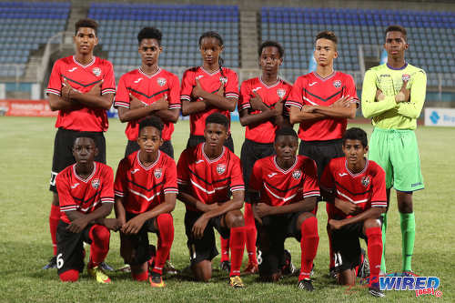 Photo: The Trinidad and Tobago National Under-15 Team players pose before kick off against a Republic Bank XI at the Ato Boldon Stadium on 15 April 2017. (Courtesy Sean Morrison/Wired868)