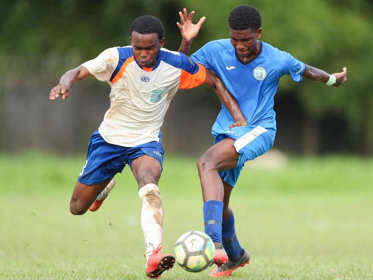 Arima North Secondary Jeremy Joseph, right, and El Dorado East Secondary Sheldon Borne tussle for the ball during the Secondary School Football League Championship match at the Arima North Secondary on September 16th 2022 in Arima. Arima North Secondary won 3-1. PHOTO BY: Daniel Prentice