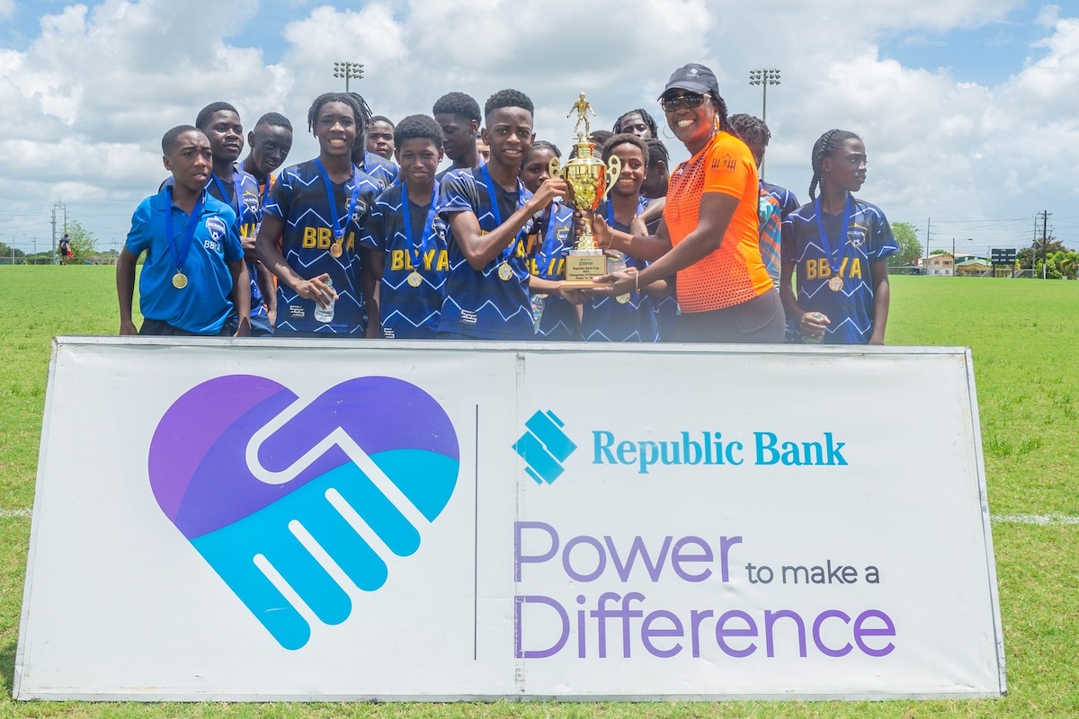 Ball Blasters Youth Academy players celebrate their Republic Cup Youth League boys’ under-14 national final victory over City FC at UTT, O’Meara on June 1st 2024. 