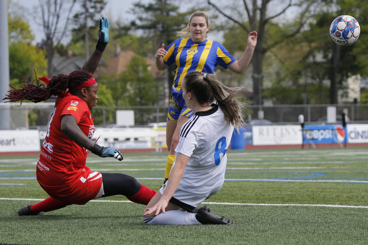 Lady Lancers’ Saundra Baron makes a save against FC Buffalo at Aquinas Institute in Rochester, New York on May 16th 2021. PHOTO BY: Ryan Bartholomew
