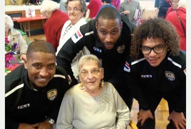 Notts County players Andre Boucaud, Yohann Arquin and Jeremy Balmy with Brenda Read, 84, a lifelong fan of the club, who has been going to Meadow Lane for 79 years.  Read more: http://www.nottinghampost.com/Christmas-comes-early-lifelong-Notts-County-fans/story-20306152-detail/story.html#ixzz2nAb8B9dr