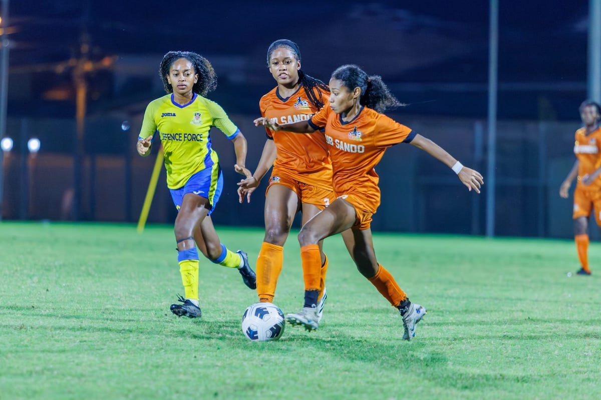 Club Sando's Alexcia Ali (right) on the ball during a semifinal clash against Defence Force at Diego Martin Sporting Complex on November 26th 2023.