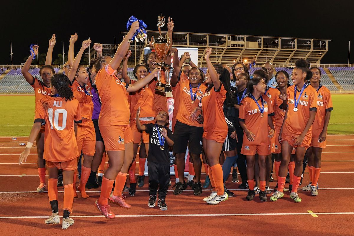 Club Sando women's team celebrate with their medals and championship trophy after defeating AC Port-of-Spain, 3-0 in the TTWoLF final match at the Hasely Crawford Stadium in Mucurapo, Port-of-Spain on Wednesday, December 13th 2023.