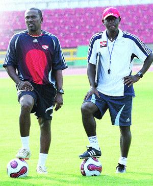 Dynamic duo reunite: Trinidad & Tobago head coach Russell Latapy, right, and his new assistant coach Marvellous Marvin Faustin take charge of national team training at the Hasely Crawford Stadium yesterday. (Photo Credit: T&T Express).