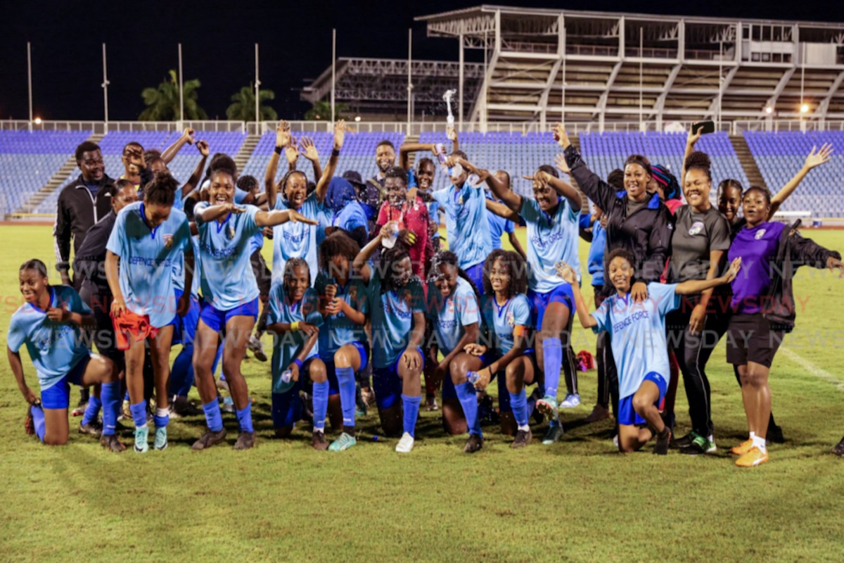 Defence Force FC women celebrate after their victory against Club Sando in the TTWoLF Conference Knockout Cup final match at the Hasely Crawford Stadium on Monday, July 29th 2024 in Port of Spain. - Photo by Daniel Prentice