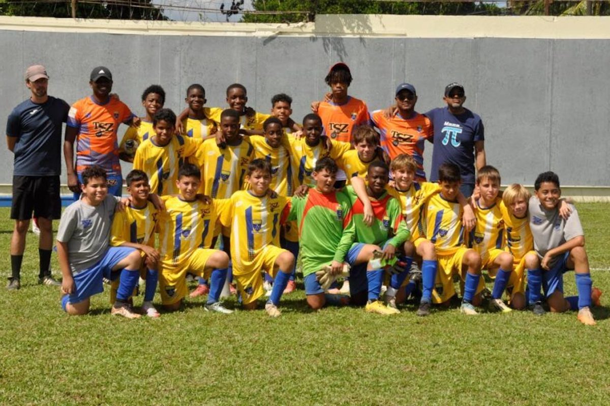 Fatima’ under-13 football team and tehcnical staff members. Included in this team photo are Fatima principal Ronald Cooper (back row, extreme right and coach Damien Frederick (back row, second from left).