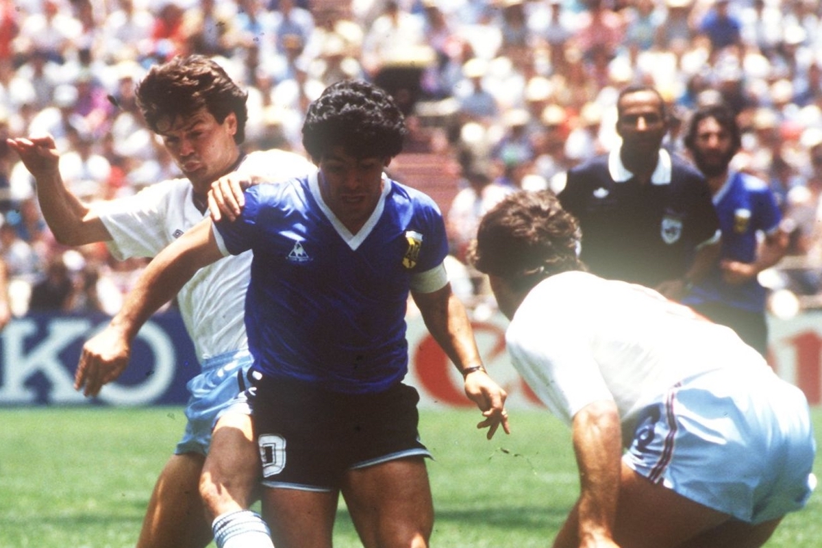 English defenders Terry Fenwick (left) and Kenny Sansom (right) try to stop Argentinian ace midfielder and goalgetter Diego Maradona. On the way to the title the Argentinian national team won their World Cup quarter final match against England in front of 114,600 spectators at the Aztec Stadium in Mexico City, Mexico on 22 June 1986by a final score of 2-1 with Maradona scoring both legendary goals for his team. (Photo by /picture alliance via Getty Images)