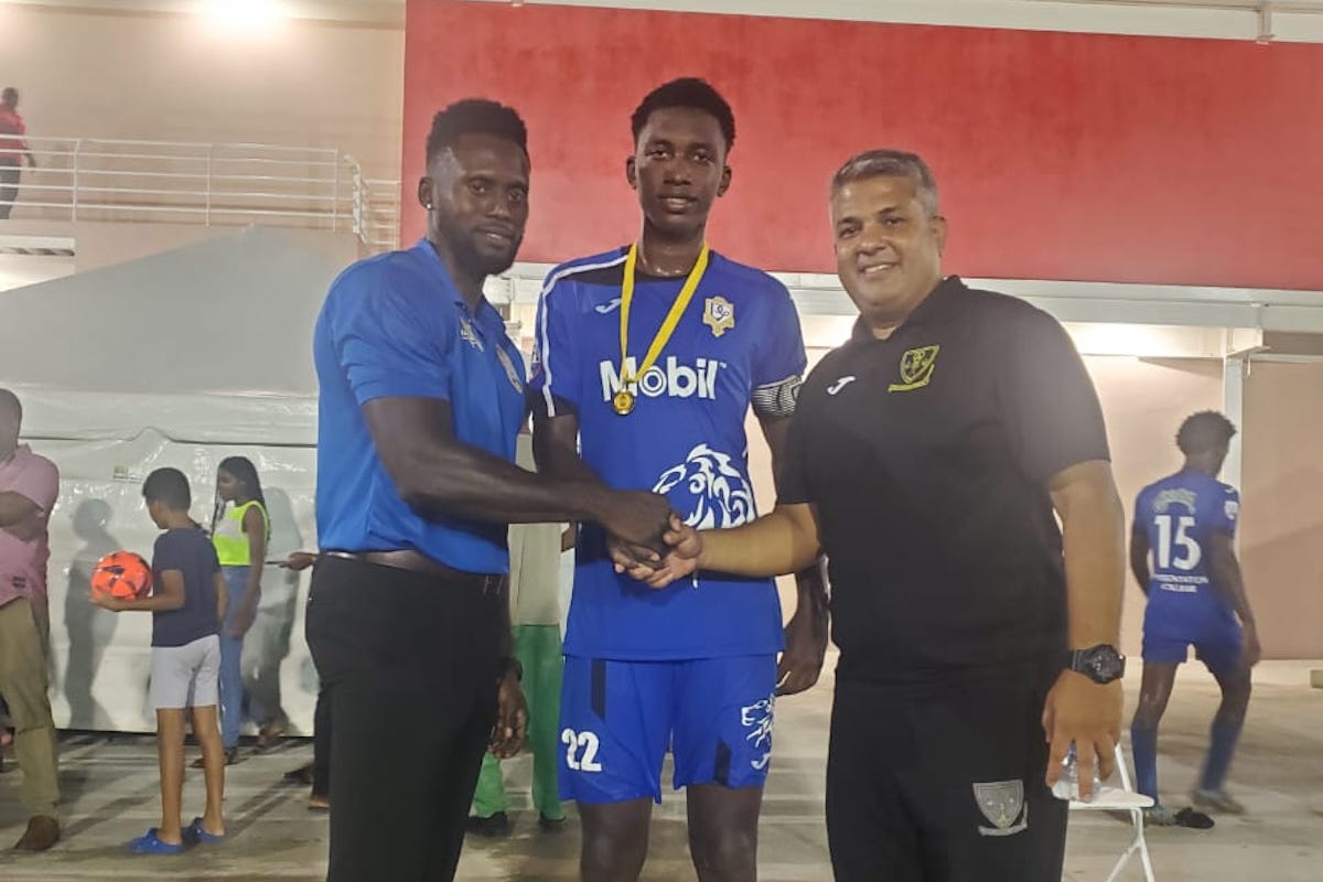 Presentation College San Fernando's Dantaye Gilbert receives the Man of the Match Award for his performance against Point Fortin East Secondary on Wednesday, November 9th 2022.