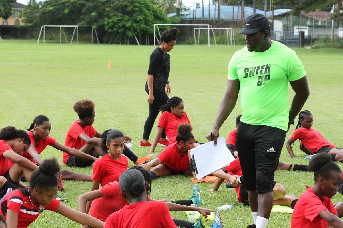 Coach Richard Hood talks to players during the TTFA Girls Under-17 Screening session at St Mary’s College, Grounds, St Clair in December 2019. PHOTO BY: Anthony Harris