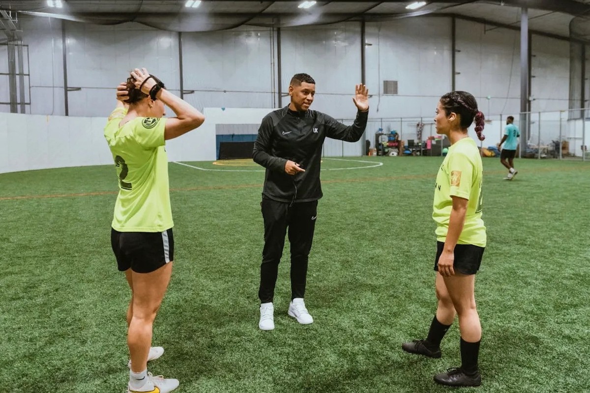 Lauryn Hutchinson (center) is the owner and academy technical director for The UNKNWN Athlete based in Richmond, Va. which specializes in youth and professional player development.