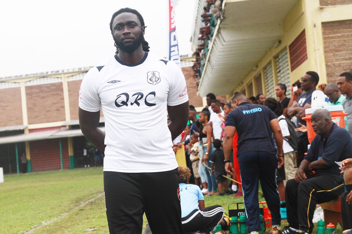 Kenwyne Jones while Assistant Coach of Queen's Royal College